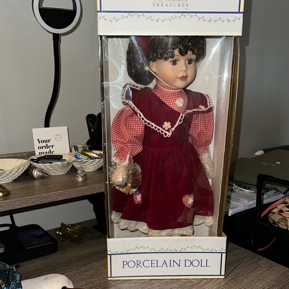 Porcelain Doll in Red Dress